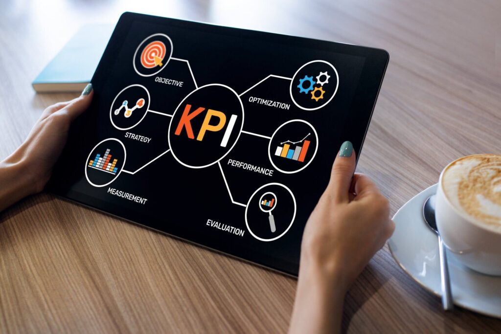 tablet showing KPI objecting strategy measurement evaluation performance and optimization graphics