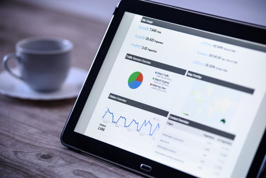 tablet with charts visuals and graphs showing information